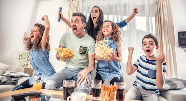 https://www.vecteezy.com/photo/27604584-family-watching-sports-match-on-tv-at-home-cheering-and-shouting-goal-with-hands-up-spilling-chips-and-popcorn-from-excitement