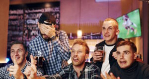 https://www.vecteezy.com/photo/15354654-football-fans-watching-tv-group-of-people-together-indoors-in-the-pub-have-fun-at-weekend-time