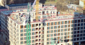 https://www.vecteezy.com/photo/36369603-high-rise-building-under-construction-installation-of-glass-facade-panels-on-a-reinforced-concrete-structure