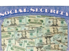 https://www.vecteezy.com/photo/7221066-many-us-dollar-bills-or-notes-inside-social-security-framework-as-concept-for-funding-crisis