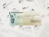 https://www.vecteezy.com/photo/15039603-refund-check-on-many-tax-form-blanks-lies-on-table-close-up-tax-payers-paperwork-routine-and-bureaucracy-concept