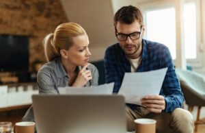 https://www.freepik.com/free-photo/young-couple-analyzing-their-budget-while-going-through-home-finances_25750277.htm#fromView=search&page=1&position=25&uuid=1d08da14-17fa-4866-95a7-50e8b0517843