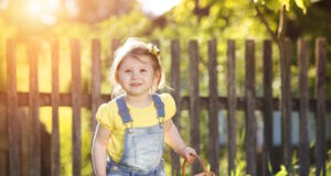 https://www.dreamstime.com/stock-photo-cute-litte-girl-little-chocolate-face-lying-grass-image59041784