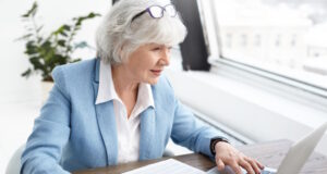 Woman at work https://www.freepik.com/free-photo/reputable-65-year-old-female-executive-stylish-bkue-suit-enjoying-wireless-high-speed-internet-connection-while-using-laptop-analyzing-accounts-holding-papers-her-hand-looking-screen_11202192.htm#fromView=search&page=1&position=19&uuid=bff9cbce-bafc-4367-9ef8-70195fb2846c