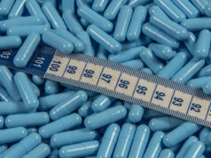 https://www.vecteezy.com/photo/34735964-blue-weight-loss-pills-and-measuring-tape-symbolizing-slimming