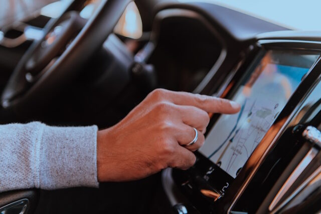 https://www.vecteezy.com/photo/31029912-close-up-of-man-hand-using-gps-navigation-inside-car