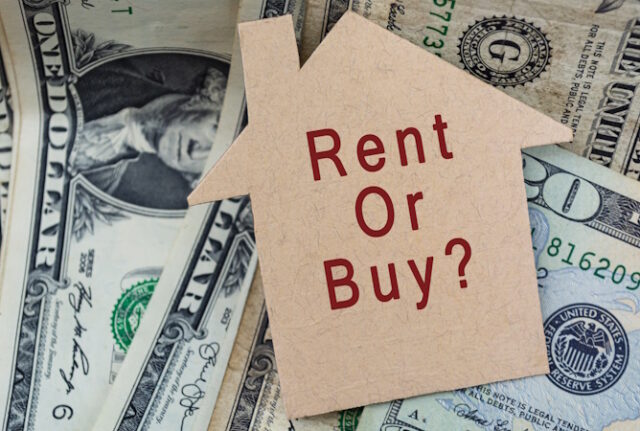 Rent or buy with question mark text on on brown paper house model with dollar banknotes on dark wooden table https://www.vecteezy.com/photo/7314332-rent-or-buy-with-question-mark-text-on-on-brown-paper-house-model-with-dollar-banknotes-on-dark-wooden-table