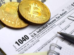 Crypto Tax https://www.vecteezy.com/photo/12583057-the-pen-bitcoins-and-dollar-bills-is-lies-on-the-tax-form-1040-u-s-individual-income-tax-return-the-time-to-pay-taxes