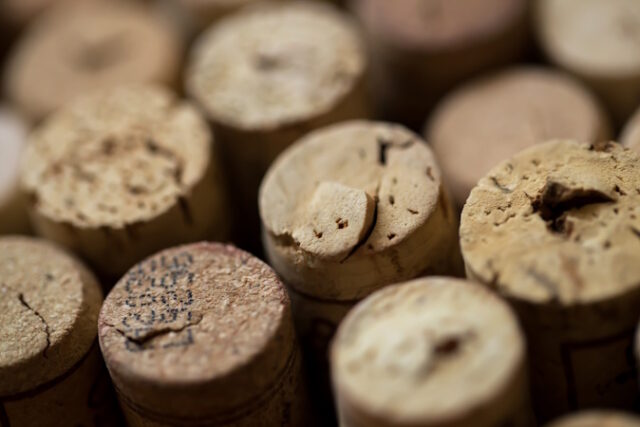 Wine corks on the table https://www.freepik.com/free-photo/wine-corks-table_6729662.htm#fromView=search&page=1&position=16&uuid=ec07f1d5-88d4-4b69-8f82-d933d3bd51e1