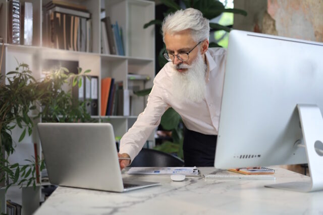 https://www.freepik.com/premium-photo/senior-businessman-with-stylish-beard-working-laptop-computer-his-office-desk_17457364.htm#fromView=search&page=1&position=14&uuid=1bebf124-f5d5-40c1-80ab-dd5eeeca7fc6