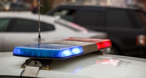 https://www.vecteezy.com/photo/12631708-police-car-lights-in-city-street-at-winter-day-with-cars-traffic-in-blurry-background