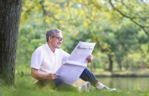 https://www.vecteezy.com/photo/35374853-senior-asian-man-reading-a-business-newspaper-while-sitting-under-the-tree-by-the-lake-at-the-public-park-for-recreation-leisure-and-relaxation-in-nature