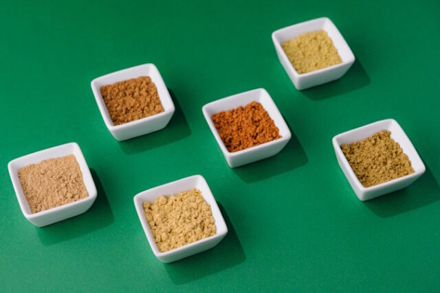 https://www.vecteezy.com/photo/37294456-various-indian-spices-in-small-white-bowls-on-green-background