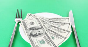 https://www.freepik.com/premium-photo/money-plate-green-background_49075277.htm#fromView=search&page=1&position=11&uuid=41e4c055-389e-4197-9624-32f34d26a52e