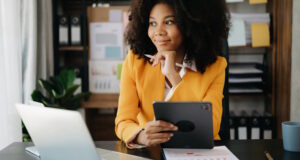 https://www.vecteezy.com/photo/24953890-beautiful-african-business-woman-typing-laptop-and-tablet-placed-at-the-table-at-the-office