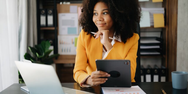 https://www.vecteezy.com/photo/24953890-beautiful-african-business-woman-typing-laptop-and-tablet-placed-at-the-table-at-the-office