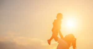 https://www.vecteezy.com/photo/7962880-silhouettes-of-mother-and-little-daughter-walking-at-sunset