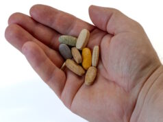 https://www.vecteezy.com/photo/42347031-a-portion-of-a-dietary-supplement-of-vitamins-in-hand