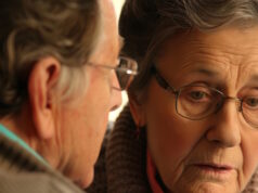 https://www.vecteezy.com/photo/46729712-a-woman-with-alzheimers-disease-being-helped-by-her-husband-to-remember-their-daily-routine