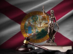https://www.vecteezy.com/photo/13837026-florida-us-state-flag-with-statue-of-lady-justice-constitution-and-judge-hammer-on-black-drapery-concept-of-judgement-and-guilt