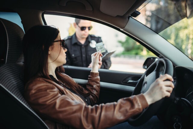 Male cop in uniform writes a fine to female driver https://www.freepik.com/premium-photo/male-cop-uniform-writes-fine-female-driver_9799190.htm#fromView=search&page=1&position=12&uuid=a5506acc-6e47-430e-9db5-961b155559ec