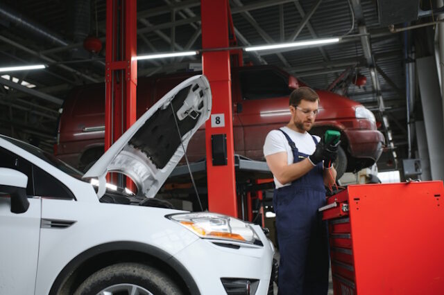 https://www.vecteezy.com/photo/41904756-auto-mechanic-working-on-car-engine-in-mechanics-garage-repair-service