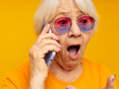 https://www.vecteezy.com/photo/25016014-photo-of-retired-old-lady-talking-on-the-phone-in-yellow-glasses-yellow-background