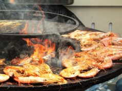 https://www.vecteezy.com/photo/35634555-seafood-slices-are-cooked-on-a-fire-pit-surface-in-the-shape-of-cone-shaped-bowl-bowl-shaped-flat-grill-with-prawns-and-shrimps-outdoor-barbecue-cooking-street-food-concept-toast-the-hot-grilled
