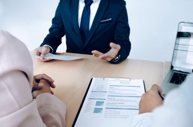 Business situation, job interview concept. Job seeker present re https://www.freepik.com/free-photo/business-situation-job-interview-concept-job-seeker-present-resume-managers_1211575.htm#fromView=search&page=1&position=11&uuid=c2d4ce80-4003-47cc-a305-ca0f2c00c72d