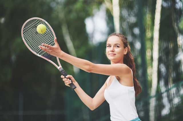A beautiful woman wearing a sportswear tennis ball. https://www.freepik.com/premium-photo/tiny-house-with-focus-functionality-aesthetics-image-reveals-wellequipped-kitchen_240995533.htm#fromView=search&page=1&position=13&uuid=223a4791-2029-43bc-b365-8c66ccee22b9