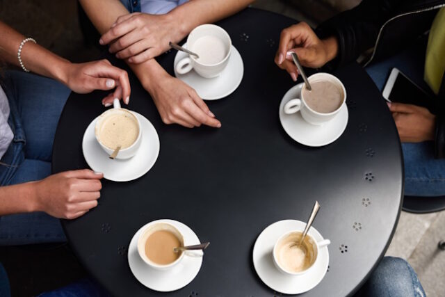 https://www.vecteezy.com/photo/4835527-top-view-of-hands-with-coffee-cups-in-a-urban-cafe