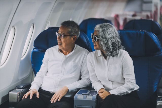 Happy elderly senior couple of travelers with suitcase in airport https://www.freepik.com/premium-photo/happy-elderly-senior-couple-travelers-with-suitcase-airport_280347881.htm#fromView=search&page=1&position=25&uuid=72598b9d-0a7c-4941-8dff-57314cb6cffb