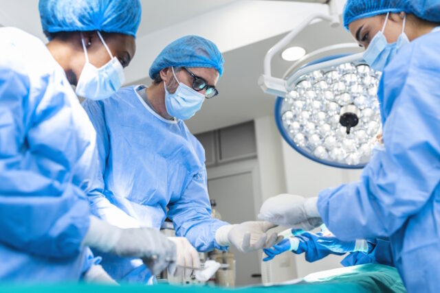 vecteezy_surgeons-performing-operation-in-operation-theater-breast_15127748 https://www.vecteezy.com/photo/15127748-surgeons-performing-operation-in-operation-theater-breast-augmentation-surgery-in-the-operating-room-surgeon-tools-implant-medical-care-concept