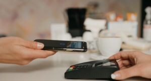 https://www.freepik.com/premium-photo/woman-preparing-pay-her-latte-with-smartphone-by-contactless-nfc-technology-cafe-female-barista-holds-out-terminal-paying-client-coffee-shop_8372575.htm#fromView=search&page=1&position=8&uuid=82fb21bd-c9ef-4fed-af53-037614db6e07