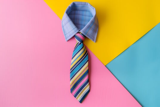 https://www.vecteezy.com/photo/46455016-a-blue-striped-tie-against-a-pink-blue-and-yellow-background