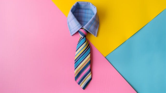 https://www.vecteezy.com/photo/46455016-a-blue-striped-tie-against-a-pink-blue-and-yellow-background