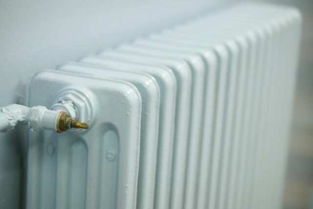 https://www.vecteezy.com/photo/53115448-blue-radiator-on-grey-white-wall-apartment-heating-installation-system