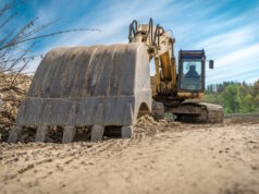 https://www.vecteezy.com/photo/1223657-excavator-parked-on-construction-site