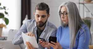 https://www.freepik.com/premium-photo/young-man-helping-aged-mother-paying-bills-online-with-credit-card-making-purchase-online-store_19246224.htm#fromView=search&page=1&position=10&uuid=215a1968-da8e-420a-a384-e1c5315a28eb