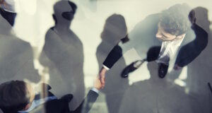 https://www.vecteezy.com/photo/20558333-handshaking-business-person-in-office-concept-of-teamwork-and-partnership-double-exposure