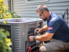 https://www.vecteezy.com/photo/32129786-hvac-technician-servicing-an-air-conditioning-unit