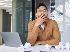 https://www.vecteezy.com/photo/46849957-tired-businessman-yawning-at-his-desk-surrounded-by-a-laptop-and-crumpled-papers-in-a-modern-office-setting-concept-of-fatigue-overworked-and-stress