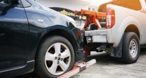 https://www.vecteezy.com/photo/6965666-tow-truck-picking-up-and-towing-old-broken-down-car-on-a-roadside