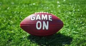 https://www.vecteezy.com/photo/40142753-ai-generated-generative-ai-american-football-ball-on-the-green-game-field-with-words-game-on
