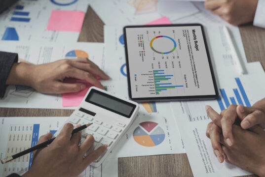 https://www.vecteezy.com/photo/13033009-business-bookkeeper-working-with-a-calculator-to-calculate-business-data-summary-report-accountancy-document-and-laptop-computer-at-the-office-business-meeting-concept
