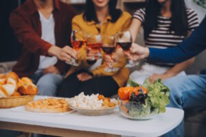 https://www.vecteezy.com/photo/49306796-happy-friends-making-a-toast-with-beer-before-eating-pizza-in-a-shared-apartment
