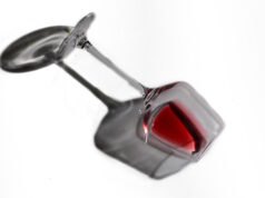 https://www.vecteezy.com/photo/50792471-red-wine-in-laying-glass-on-white-background