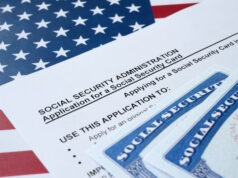 https://www.vecteezy.com/photo/12987907-united-states-social-security-number-cards-lies-on-application-from-social-security-administration-on-us-flag