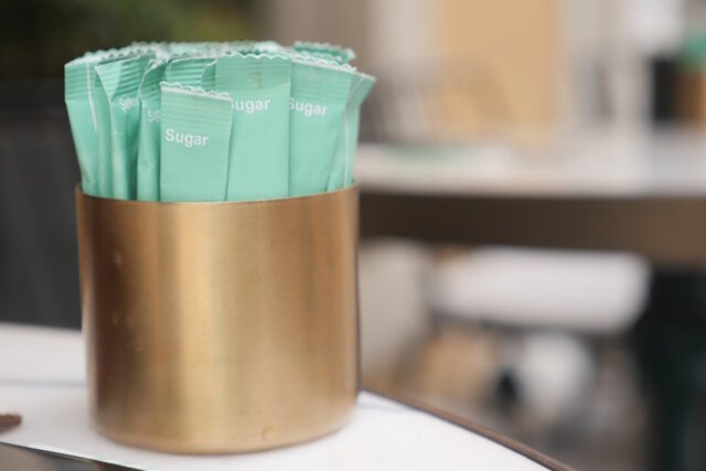 https://www.vecteezy.com/photo/45353947-white-sugar-in-a-paper-packet-on-table