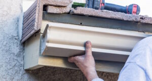https://www.vecteezy.com/photo/16446164-worker-attaching-aluminum-rain-gutter-to-fascia-of-house